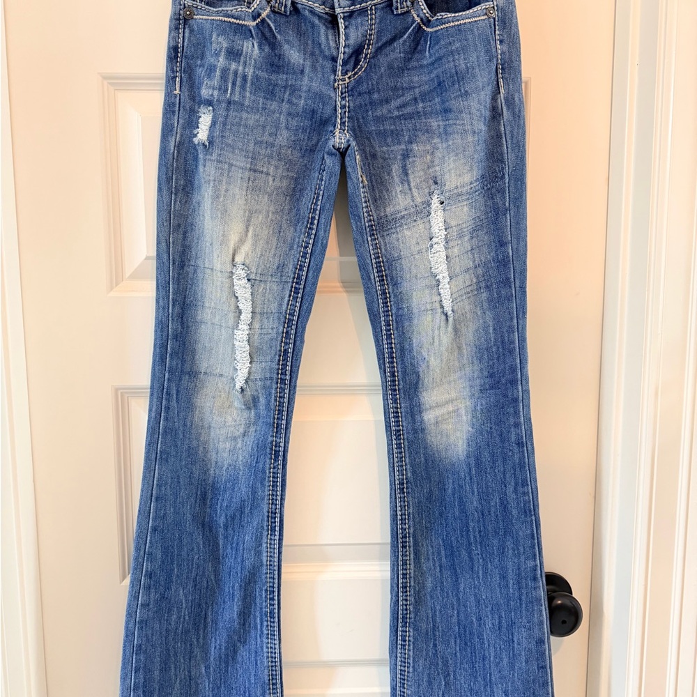 Women's Blue Flare Jeans with Distressed Detail